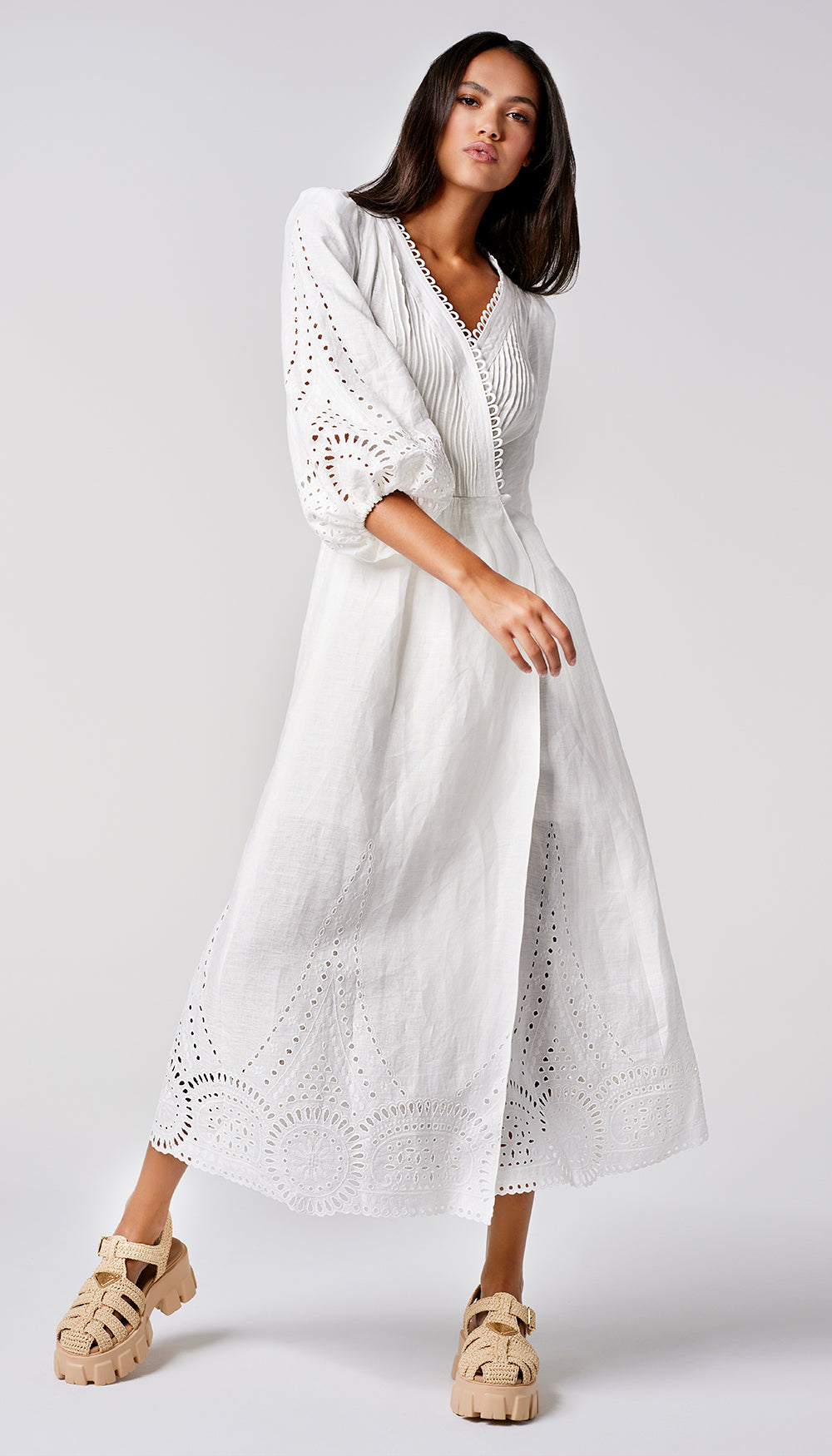 A woman in a white dress.